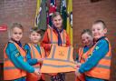 Children at 16th Wyre Forest (St Michael’s) Scout Group in Stourport with their hi-vis vests