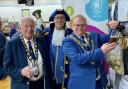 Pulling a pint – Mayor of Kidderminster, Cllr Darren Chambers (right), with Stourport Mayor Cllr Mike Freeman and Kidderminster Town Crier Steve Day