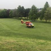 The air ambulance landed on Kidderminster Golf Club as medics raced to the woman's aid