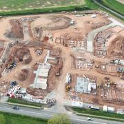 A drone image shows the latest work on the new housing development