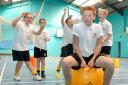 RECORD BREAKERS: Josh Harrison, 12, attempts to break the world record for the fastest 100 metres on a space hopper. 401403M