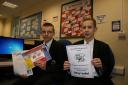 SAFETY FIRST: Michael Harrison, year 8, left and Jordan Neill, year 9 with their posters.