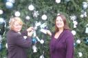 Offering solace: Ros Darby, Swan Centre manager, and Ali Taylor, head of operations at Kemp Hospice, in Kidderminster last year, with the Light up a Life Christmas tree.