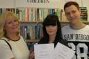 THANKS: Andrea Maddocks presenting two of the student volunteers, Alice Liggins and Ben Owen, with certificates.