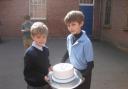 Special cakes: George and Edward Battin with a snowdrop cake.