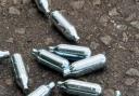 Discarded laughing gas canisters
