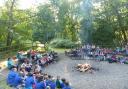 Beavers enjoying a sing-song around the campfire