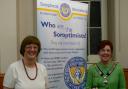 President Stephanie Ainsley (left) hands over to Incoming President Christine Holloway