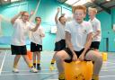RECORD BREAKERS: Josh Harrison, 12, attempts to break the world record for the fastest 100 metres on a space hopper. 401403M