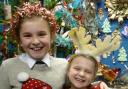 WINTER WOOLIES: Burlish Park sisters Bethan, 10, and Georgia Hyde, 8, celebrating Save the Children's Christmas Jumper Day.