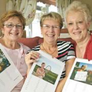 Calendar girls: From left, Cheryl Mackinnon, Sheila Lane and Jill Beddall, who posed for a cheeky calendar to raise funds for the Millbrook Appeal. Buy photo: 450918JH.