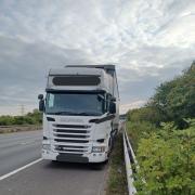 TAKEN: The seized lorry on the M5 in Worcestershire. Pic. Worcs OPU