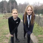 Cross Country runners Molly Foster (left) and Darcie Lees