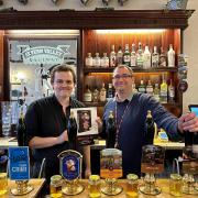 Assistant manager Louis Chance (left) and manager Paul Corner (right) behind the bar of the King and Castle