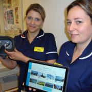 Tammie Mason (left), manager of Ward One at Kidderminster Hospital and ward sister Natalie Plimmer with the VR equipment