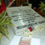 Touching tribute: The picture of Betty Yates on Mother Teresa’s tomb in Calcutta, India.