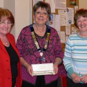 Kidderminster Soroptimists' new President Hilary Thompson (middle) with Outgoing Presidents Shirley Bonas (left) and Stephanie Ainsley (right)
