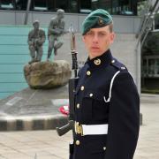 Green beret: Josh Strange completed his Royal Marine training.