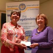 President Hilary Thompson (left) presents the cheque to Mrs Denise Carson, a volunteer with the Kidderminster Food Bank