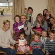 It’s a toddle: Mums and toddlers from Clows Top who helped raise £800 with fun and games.