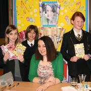 Book keepers: From left, Chantry School student Ellie Clayton, Baxter College pupil Abby Lawson, Cathy Cassidy and Stourport High School student Aimee Johnson.