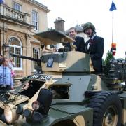 Storming in: Jack Greystone and Sam Whitehouse arrived at King Charles’ prom by tank.