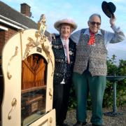 Tuning up: Beryl and Aubrey Tipping with their street organ. They will be playing in the Swan Centre tomorrow and Saturday.