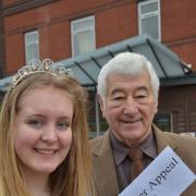 Appeal boost: Peter Picken receiving a cheque from Kidderminster Carnival queen Hannah Rees.