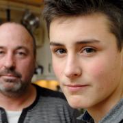 Modelling dream: Paul Pulling and his son Callum, who has been signed up by an agency for photographic assignments. Picture: Phil Loach. 051425L.