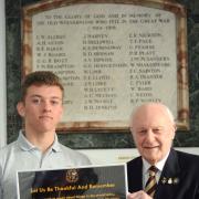 REMEMBER THEM: Poetry competition winner Connor Rook, 16, with Kidderminster Royal British Legion secretary Peter Dunn.