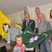 ANNIVERSARY REUNION: From left, Sally Mackillop, Charles Toby, 85, Jim Sayner, 78, Andy Mackillop, assistant cub leader, Ron Jennings, 87, Ann Bennett, beaver leader, and Derek Jennings, 83, with Billy Brookes, 5,. Picture: Colin Hill