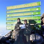 TOP OF THE WORLD: Alex and Chris Jordan at Gilman's Point, 5,800 metres up Mount Kilimanjaro.