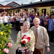 GOLDEN COUPLE: Laura and Martin Hobson welcomed 24 members of their family on a private journey along the Severn Valley Railway. Picture: Colin Hill