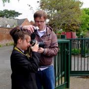 FOCUSED: Wolverley student, Amy Fleming, receiving advice from Worcester News photographer, Nick Toogood.