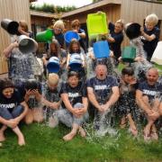 FREEZING FUNDRAISERS: Staff and volunteers at Kemp Hospice complete the ice bucket challenge.