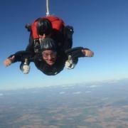 CHARITY SKYDIVE: Director Richard Bridge completing the fundraising challenge.
