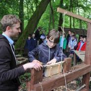 FOREST SCHOOL: Jordan Scott, school teacher, and pupil Theo Gabb, 12, during a design and technology session.