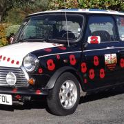 MOBILE MEMORIAL: Mike and Alan Winspur's poppy Mini will remember those who lost their lives in war.