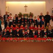 REMEMBRANCE: Pupils from Wilden All Saints, Lickhill and St Wulstan’s primary schools with the dedicated poppies.