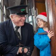 CHRISTMAS CARRIAGE: Evelyn Sanders, then aged 4, enjoying a trip on Severn Valley railway last year.