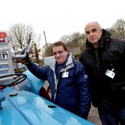 FUNDRAISING RUN: Support group members Paul Markall and David Underhill with 'Rory the Robot'. Picture: Colin Hill