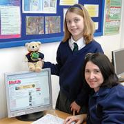 Screen test: Philippa Harper and teaching assistant Lynda Williams post the first Burlish Park Primary School article on the Shuttle website.
