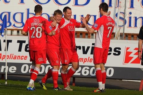 Anthony Malbon celebrates his goal with Marvin Johson, Steve Guinan and Dave Hankin.