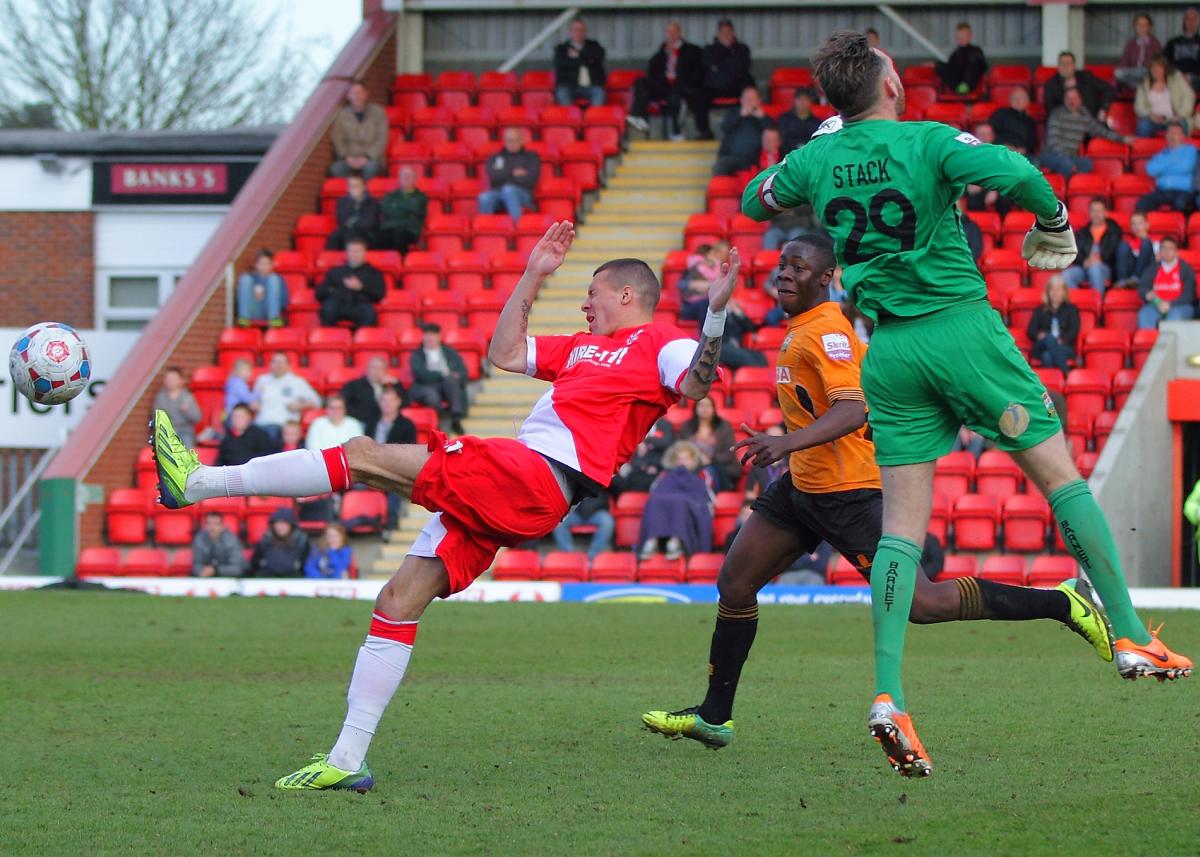 HARRIERS' revival under new manager Gary Whild continued as Kidderminster edged out their rivals for the play-offs thanks to Michael Gash's winner. Bees keeper Graham Stack was also shown a straight red card late on for catching winger Marvin Johnson in t
