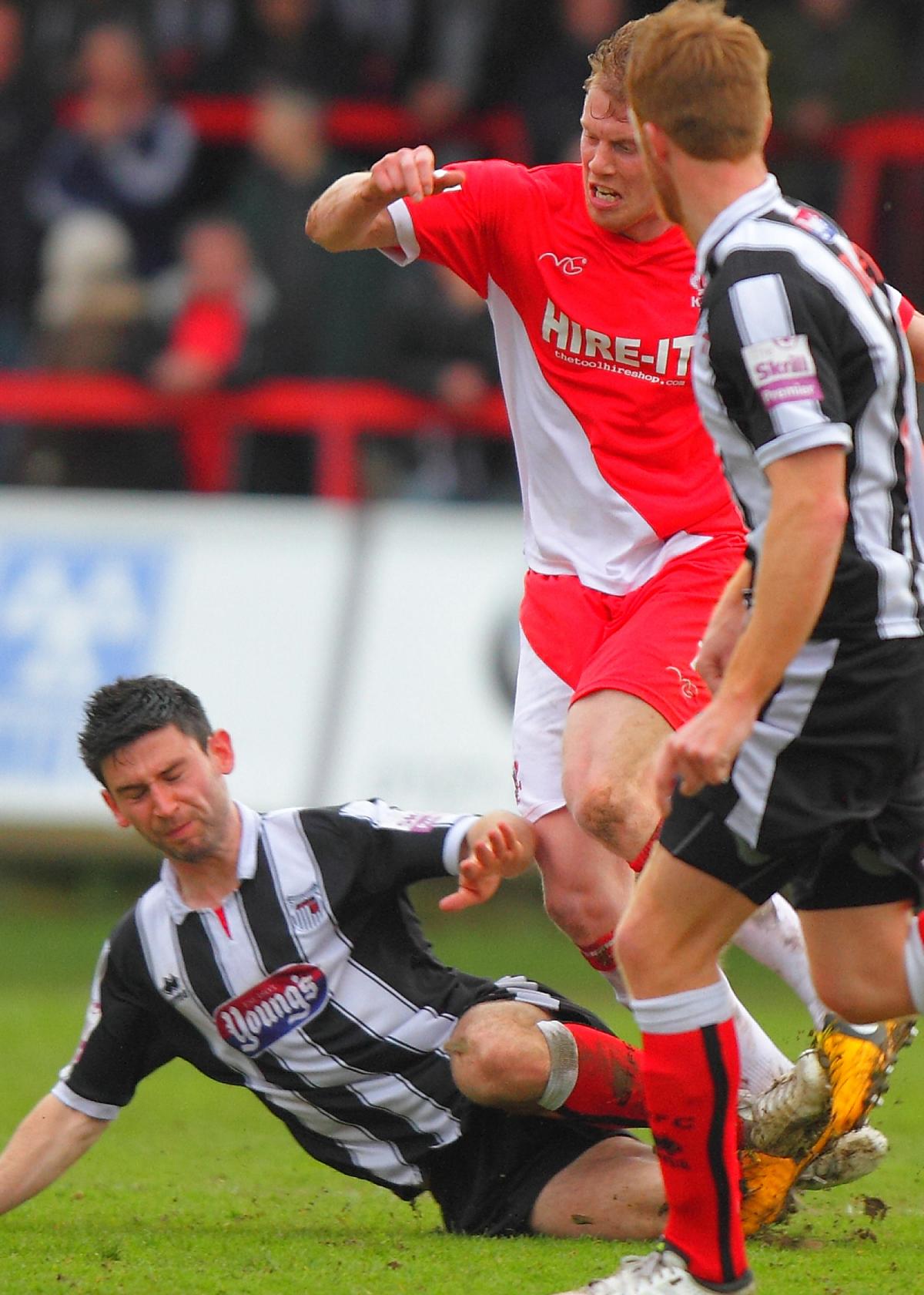 GARY Whild suffered his first defeat as Harriers boss against play-off rivals Grimsby. Alex Rodman's eye-catching effort proving to be the difference.