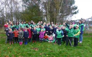 LITTER PICKERS: More than 40 children and parents of Burlish Park Primary School helped out at the tidy up event.