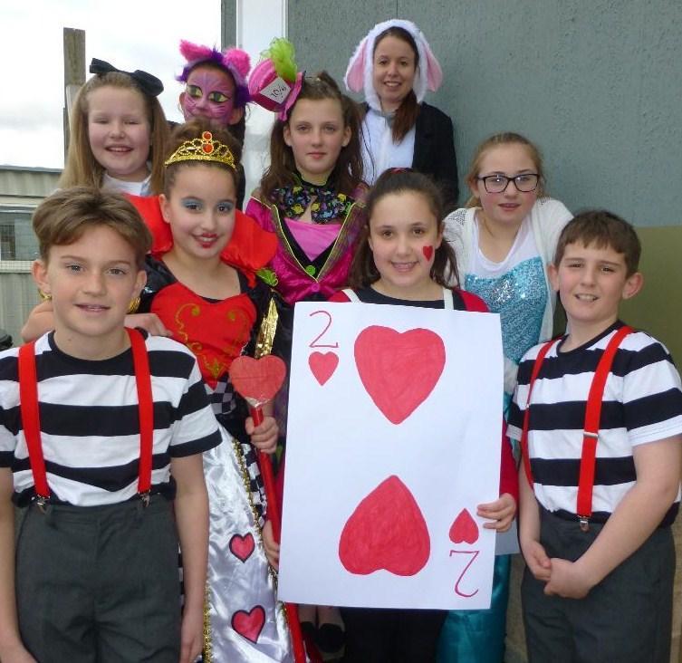 Year Six pupils from Burlish Park Primary School dress up as characters from Alice in Wonderland