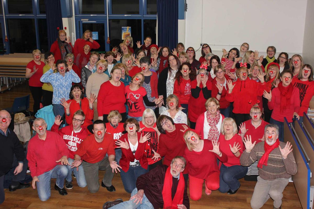 Members of the Got 2 Sing choirs donned their their red noses and wore all red to raise money for Comic Relief