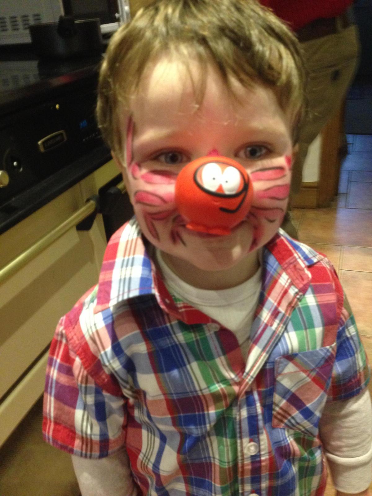 Little Luke O'Regan on his way to Barnabee's Nursery in Kidderminster, with his face painted