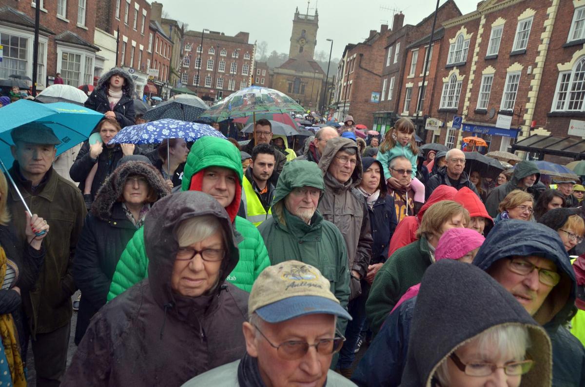Crowds battle the rain to watch Bewdley Passion 2015. PIC: Colin Hill